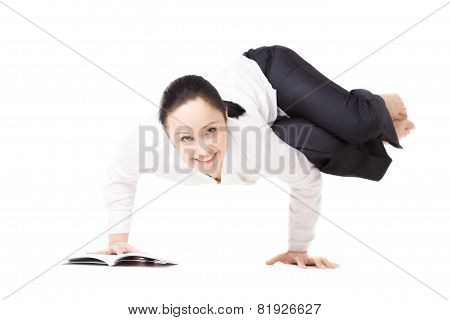 Young Woman In Formalwear Doing Fitness Exercises With Book On White Background