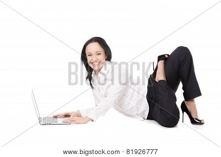 Young Office Woman Sitting In Yoga Pose In Front Of Laptop On White Background
