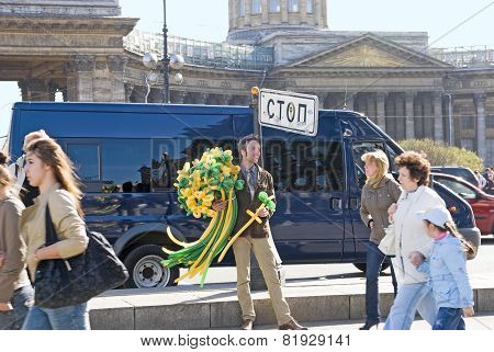 Saint-Petersburg. Russia. Young man with balloon flowers