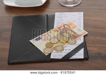 Bill With Euro Note On Table