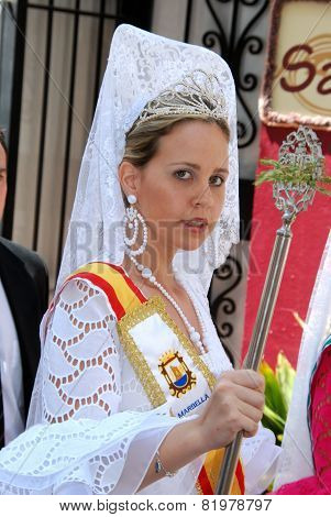 Spanish girl in traditional dress.