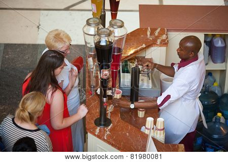 People Buying Fruit Juice