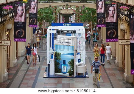 People Walking Near The Perfume Department At Gum Store