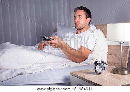 Man Changing Television Channels