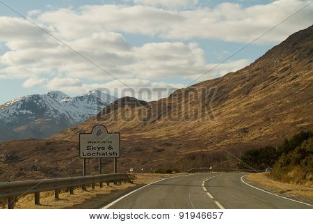 Fort William, Scotland - March 2013: A View From The Car With The Sign On The Road
