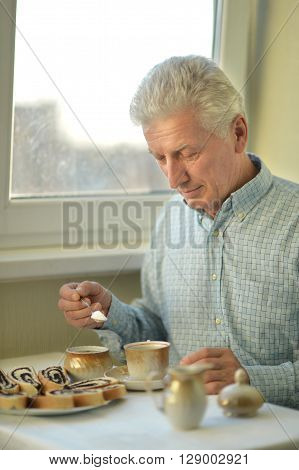 Beautiful elderly man at home with cup of tea
** Note: Soft Focus at 100%, best at smaller sizes