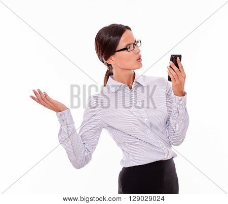 Angry Brunette Businesswoman With Cell Phone