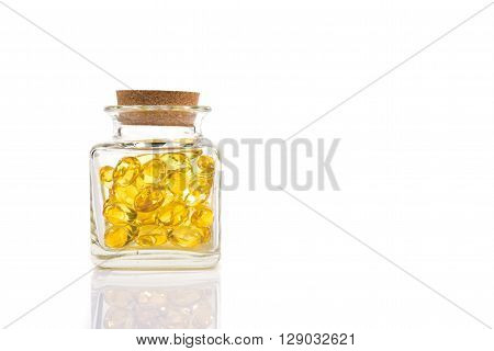 Fish Oil Capsules In Translucent Bottle On White Background