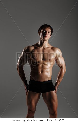 Strong Athletic Man Showing Muscular Body And Sixpack Abs. Showing His Body. Fitness Model. Great Fo