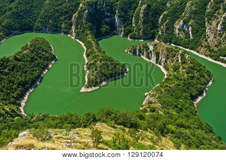 Meanders at rocky river Uvac gorge on sunny morning, southwest Serbia
