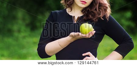 Beautiful Girl Holding A Green Apple