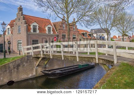 Small wooden bridge over a canal in Medemblik Netherlands