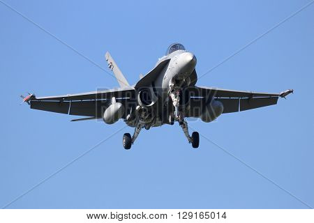 LEEUWARDEN NETHERLANDS - APR 11 2016: Finnish Air Force F-18 Hornet landing during the exercise Frisian Flag. The exercise is considered one of the most important NATO training events this year.