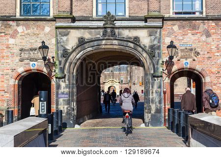 Gouda Netherlands - April 20 2016: The Waag with unidentified people. It was built in 1667 and was used for weighing goods especially cheese to levy taxes. It now is a national monument