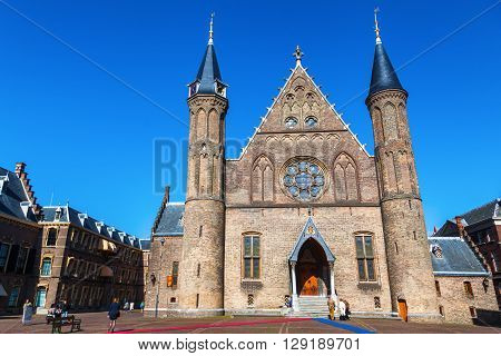 Gouda Netherlands - April 20 2016: The Waag with unidentified people. It was built in 1667 and was used for weighing goods especially cheese to levy taxes. It now is a national monument