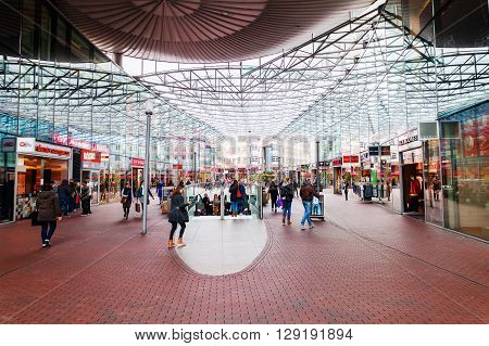 Zoetermeer Netherlands - April 22 2016: shopping center Spazio with unidentified people. From villages with 10000 inhabitants Zoetermeer grew up after 1962 to a city with 100.000 inhabitants 1991