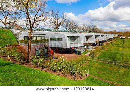 Hilversum Netherlands - April 19 2016: sound barrier houses called The Cyclops. They are part of a sound proof embankment designed by NIO architects.