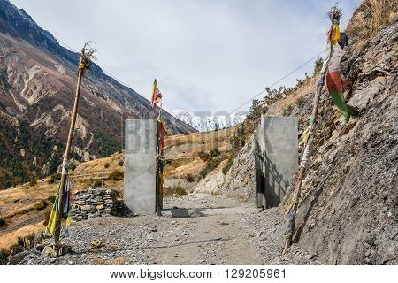 Entrance to traditional Nepali village - Khangsar. Annapurna region.