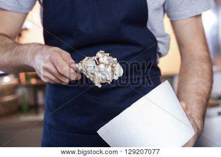 Waiter Putting Butterscotch Ice Cream In Cup