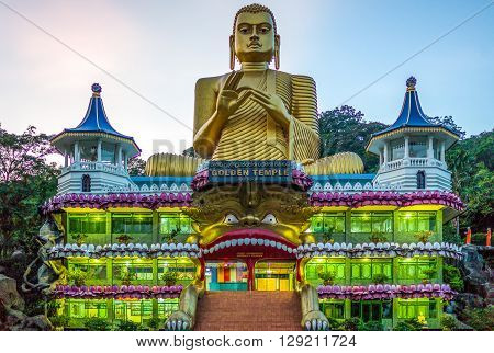 Danbulla Sri Lanka - December 5 2012: The large Buddah statue at the entrance of the Golden Temple