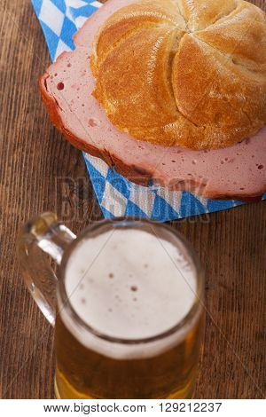 bavarian meatloaf in a bun with beer