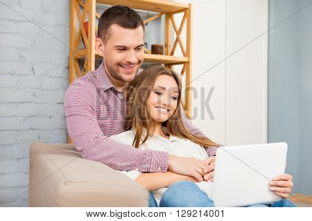 Man And Woman In Love Watching Film On Laptop