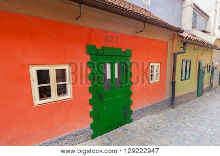 PRAGUE, CZECH REPUBLIC - APRIL 28, 2016: Golden Lane, Czech Zlata Ulicka is a very popular tourist attraction thanks to its legends as if 16th century alchemists worked here. Franz Kafka lived here