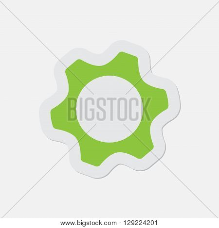 simple green icon with contour and shadow - cogwheel on a white background