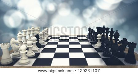 Black and white chess pawns defecting against blue sky