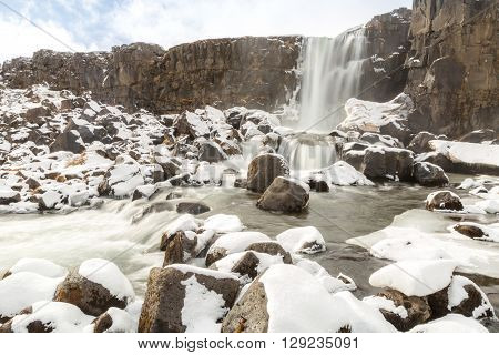Oxararfoss Waterfall in the winter in pingvellir valley  National Park in Iceland