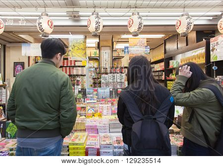 TOKYO -APR 02 : Unidentified tourists in the Senso-ji Temple on Apr 02 2016 in TokyoJapan.The Senso-ji Buddhist Temple is the symbol of Asakusa and one of the most famous temples in all of Japan