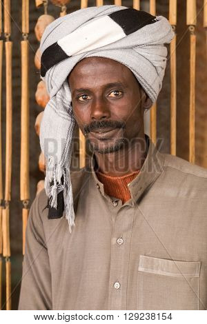 DARAW, EGYPT - FEBRUARY 6, 2016: Portrait of local man with turban.