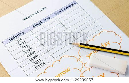 english grammar exercise with pencil on table