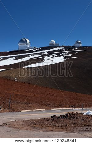 Observatory domes at the peak of Mauna Kea volcano Maui Hawaii islands