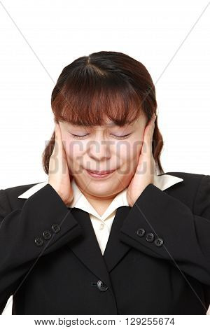 Asian businesswoman suffers from noise on white background