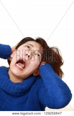 portrait of demented woman on white background