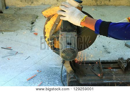 Electrical cutting machine during cutting steel on the building site