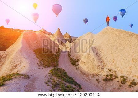 Balloon silhouette in the sunrise sky. Cappadocia, Turkey