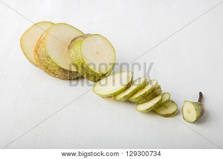 Sliced pear on white background