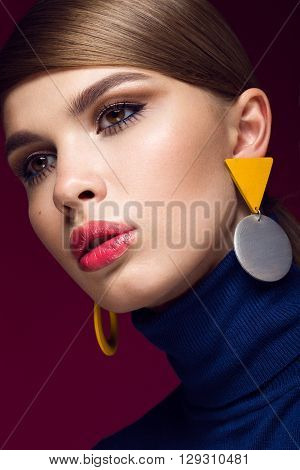 Pretty fresh girl, fashionable image of modern Twiggy with unusual eyelashes and bright accessories. Photos shot in studio