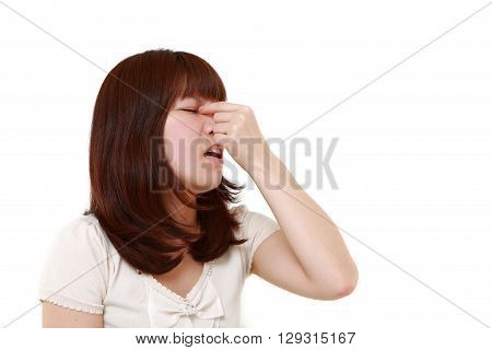 portrait of woman suffers from Asthenopia on white background
