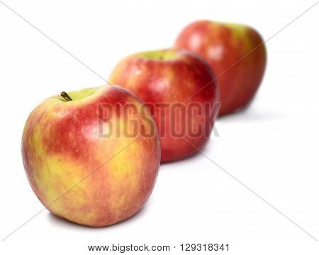 Organic, red apples, isolated on white background.
