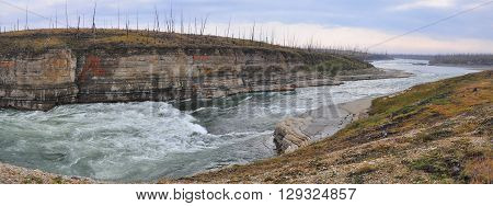 Panorama of rapid in a rocky canyon. The Fish river canyon on the Putorana plateau.