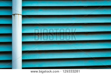 Close up some of wall in the old wooden house Painted bright blue