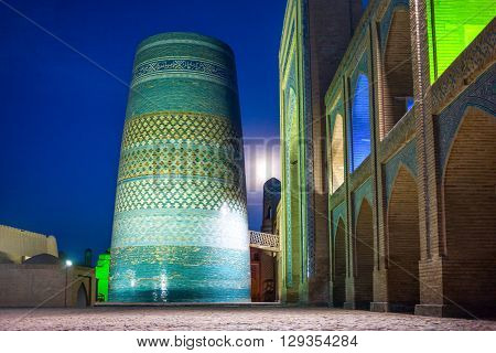 Uzbekistan Khiva night view of the Kalta Minor minaret at Muhammad Amin Khan Madrassah