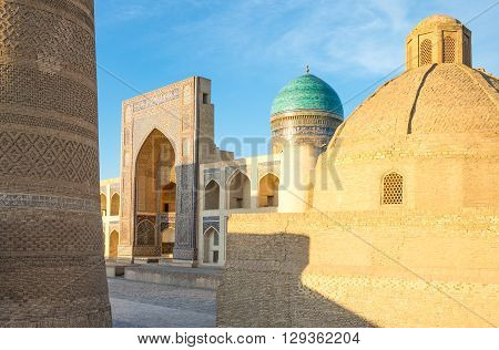 Uzbekistan Bukhara the Mir-i-Arab madrassah with the Kalon minaret on the left