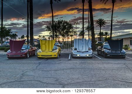 SCOTTSDALE AZ - SEPTEMBER 5: Four classic Chevrolet Corvettes photographed against the sunset on September 5 2015 in Scottsdale Arizona