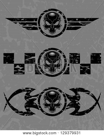 Set of dark skulls with decorative elements on grunge background