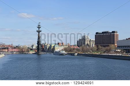 MOSCOW, RUSSIA - APRIL 12, 2016: Panoramic view of Moscow from the Krymsky Bridge view on Krymskaya waterfront the left is a monument to Peter I right - President Hotel