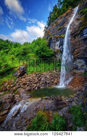 Amazing view of the waterfall near Lungerersee lake. Lungern village, Switzerland, Europe.